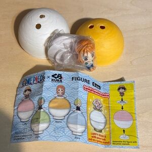One piece  Toy Figure with Yellow and White Capsule